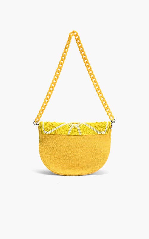 Yellow lemon slice-shaped bag with beaded detailing and a matching twisted rope shoulder strap.