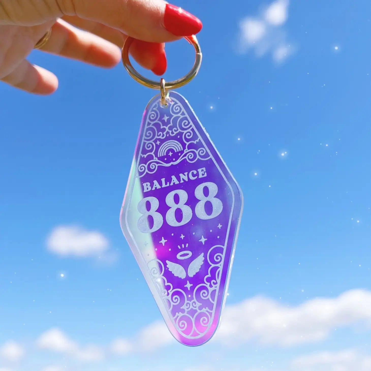 Angel Number Motel Keychain, combining symbolic angel numbers with a nostalgic motel key design.