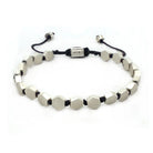 Adjustable bronze bracelet with geometric design, featuring a mix of bronze and black components.