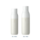 LARQ white water bottle with UV-C LED cap active, floating on a white background.
