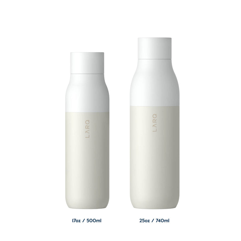 LARQ white water bottle with UV-C LED cap active, floating on a white background.