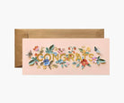 A congratulations card with colorful floral designs and gold "Congrats" lettering, paired with a gold envelope.