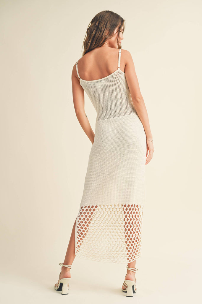 Model wearing the Maren Knitted Dress with delicate straps, mesh waist detail, and open-stitch hem.