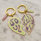 Soulmate Split Heart Keychain with a heart split into two halves, each with the word “soulmate.”