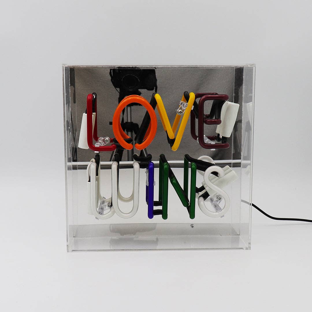 'Love Wins' Neon Light - A bright and inclusive symbol of love and unity.