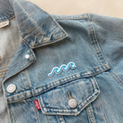 Waves Patch - Captivating accessory featuring a detailed waves design for a touch of seaside charm.