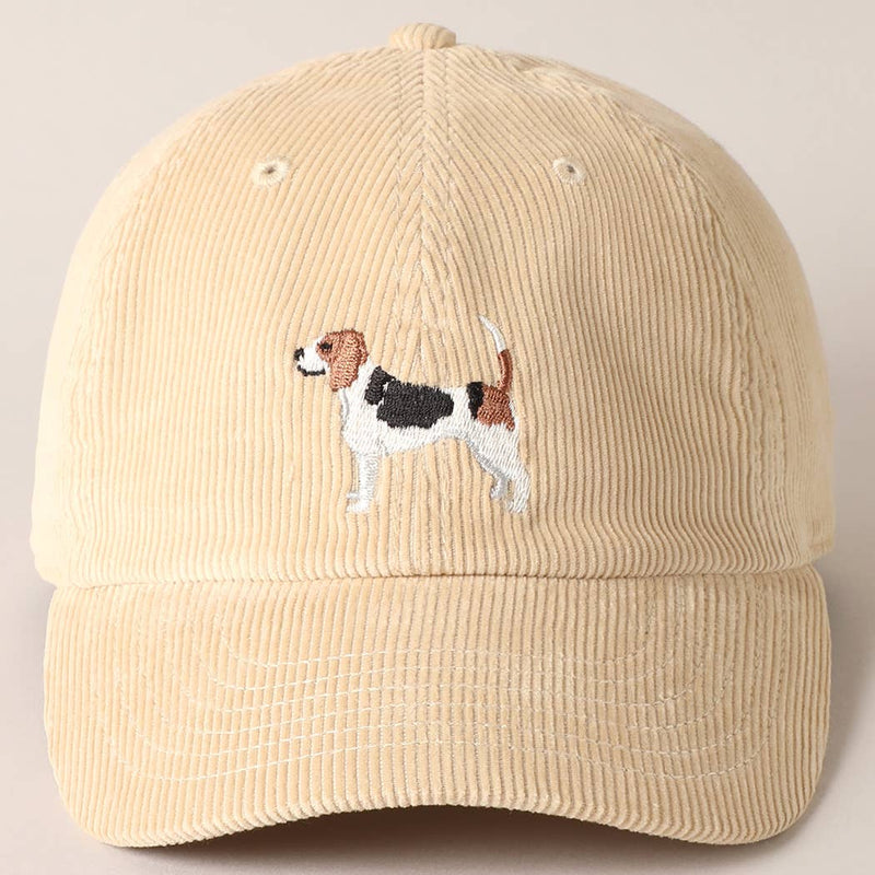 Beige corduroy baseball cap with embroidered beagle dog design on the front.