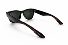 Sunglasses with black frame and tortoiseshell arms on a white background