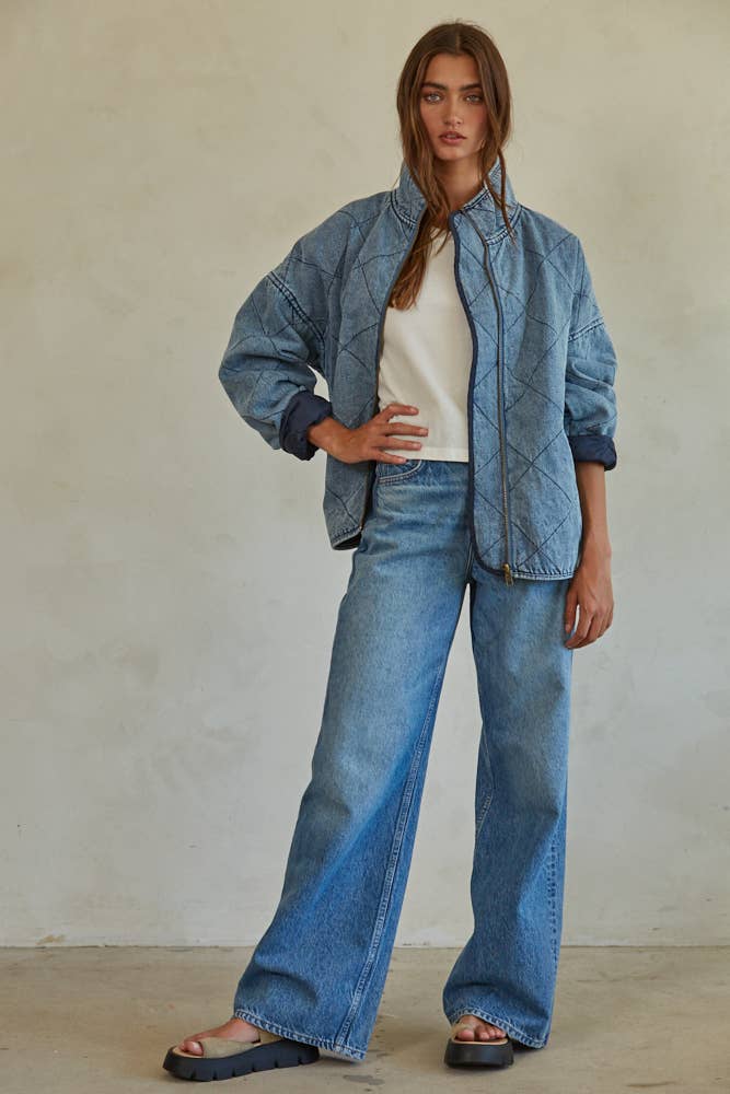 A denim jacket with a serene, minimalist design.
