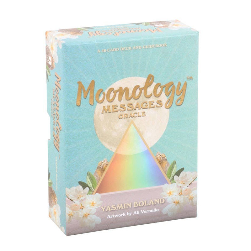 Moonology Messages Oracle deck in pastel aqua packaging with a glowing moon, rainbow prism, and white blossoms.