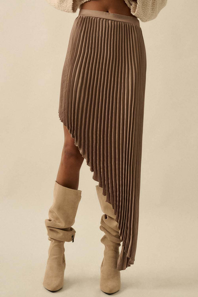 Brown asymmetric pleated skirt with flowing high-low hem.