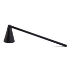 Skeem Design black candle snuffer with a minimalist design, perfect for safely extinguishing candles.