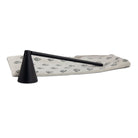 Skeem Design black candle snuffer with a minimalist design, perfect for safely extinguishing candles.