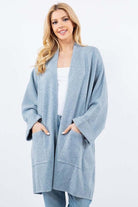 Olivia Cardigan showcasing its open-face design, lightweight knit fabric, and ribbed detailing, ideal for effortless and stylish layering.