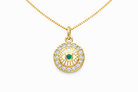 Gold necklace with an eye-shaped pendant on a white background