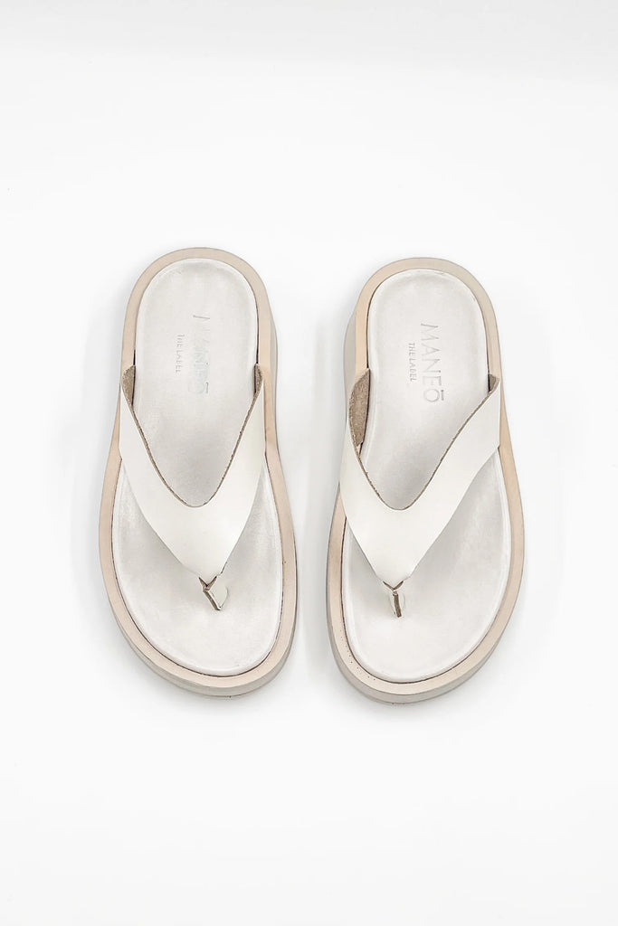 The stylish Caylee Sandal displayed against a neutral backdrop, highlighting its elegant and versatile design.