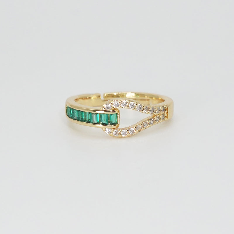 Broadway Ring: Sparkling green stones adorn this glamorous piece, epitome of elegance.