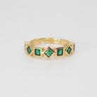 Catalina Ring: Mesmerizing green stones arranged in sleek square shapes, epitome of modern elegance.