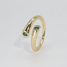 Thalia Ring: Twin mesmerizing green stones, epitome of elegance.