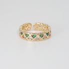 Lagoon Ring: Heart-shaped designs with shimmering stones and vibrant green accents, epitome of romance.