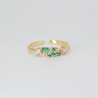 Cypress Ring: A dazzling array of shiny and green stones, epitome of opulence.
