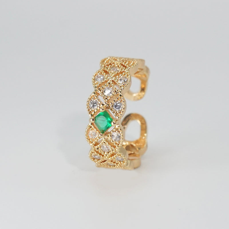 Jasmine Ring: Shimmering stones encircling a captivating green centerpiece, epitome of elegance.