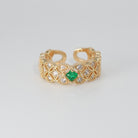 Jasmine Ring: Shimmering stones encircling a captivating green centerpiece, epitome of elegance.
