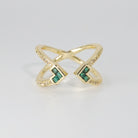 Cress Ring: A stunning combination of shiny and green stones, epitome of elegance.
