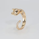  Lindsey Ring: Charming cat figure adorned with sparkling stones, adding whimsy and elegance to your style.