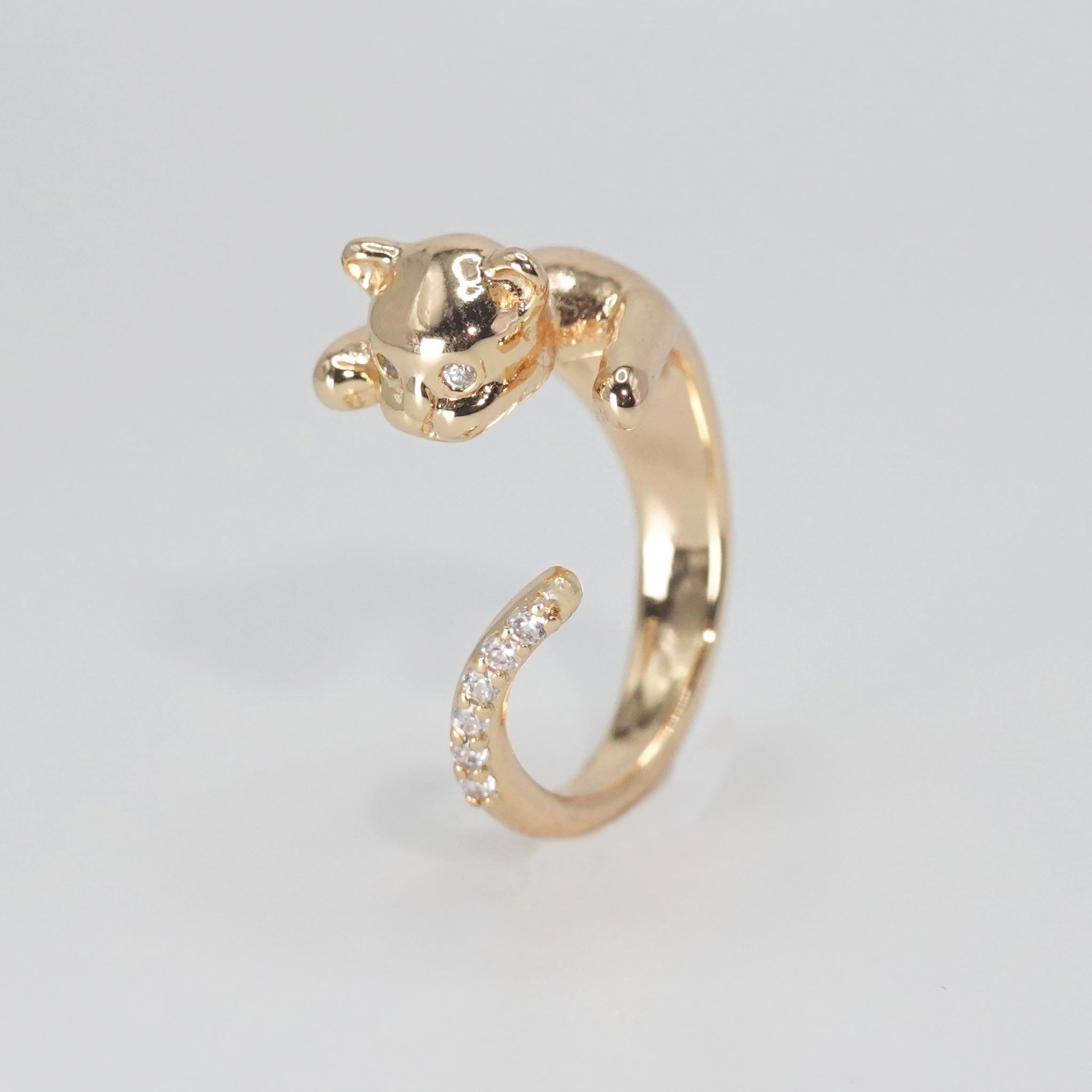  Lindsey Ring: Charming cat figure adorned with sparkling stones, adding whimsy and elegance to your style.