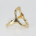 Carnation Ring: Bold shark mouth-shaped design, adding edgy flair to any ensemble.