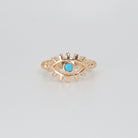 Poinsettia Ring: Enigmatic eye-shaped design, exuding intrigue and sophistication.