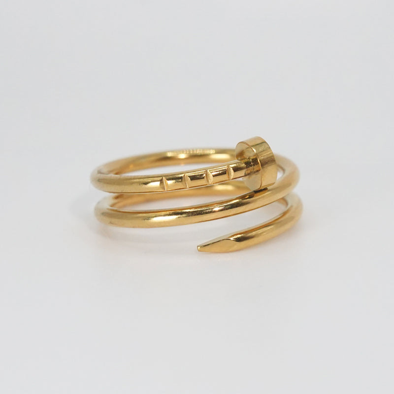 Garnet Ring: Striking nail-shaped design, adding edgy glamour to any outfit.