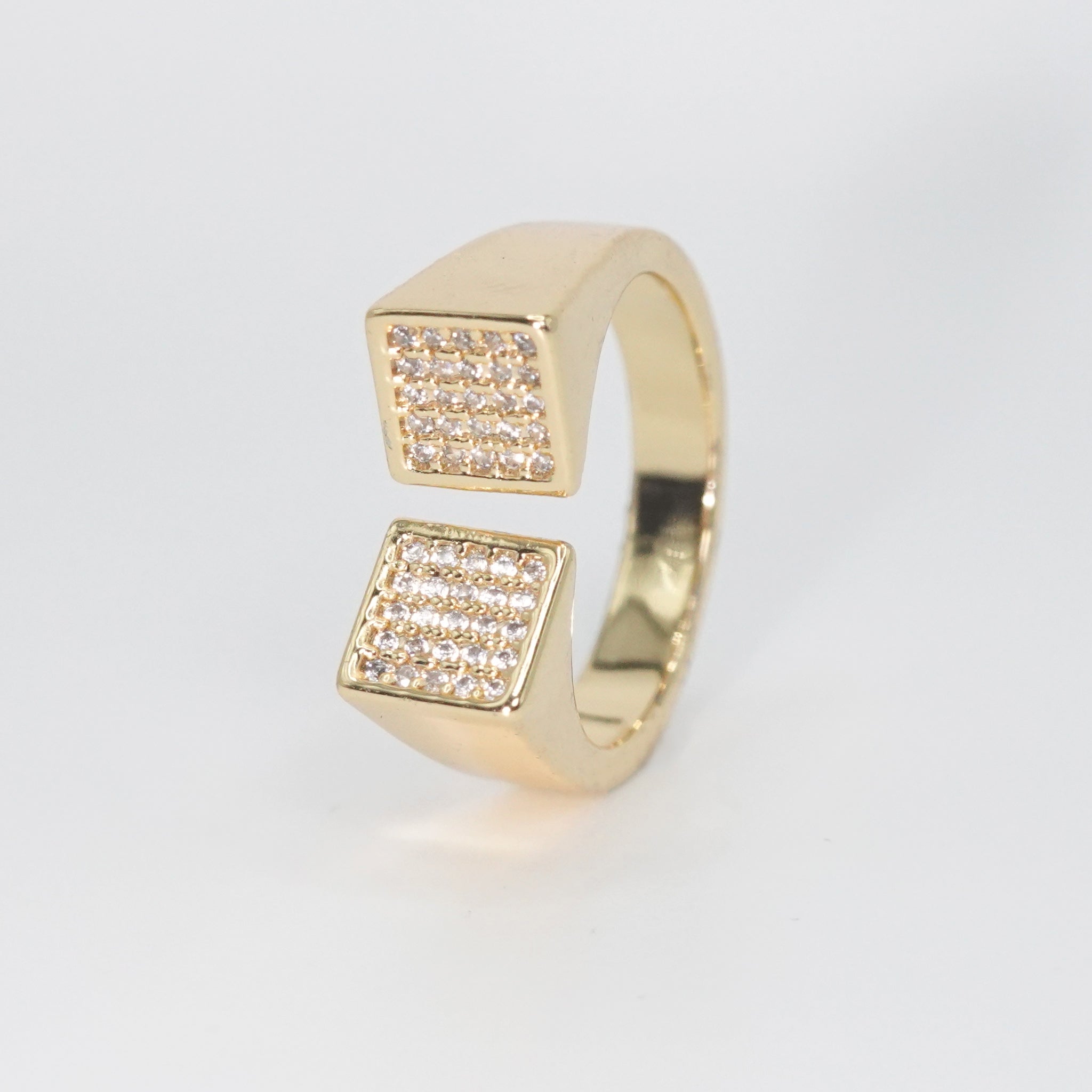 Mullholland Ring - Exquisite design with two intersecting squares adorned with dazzling stones.