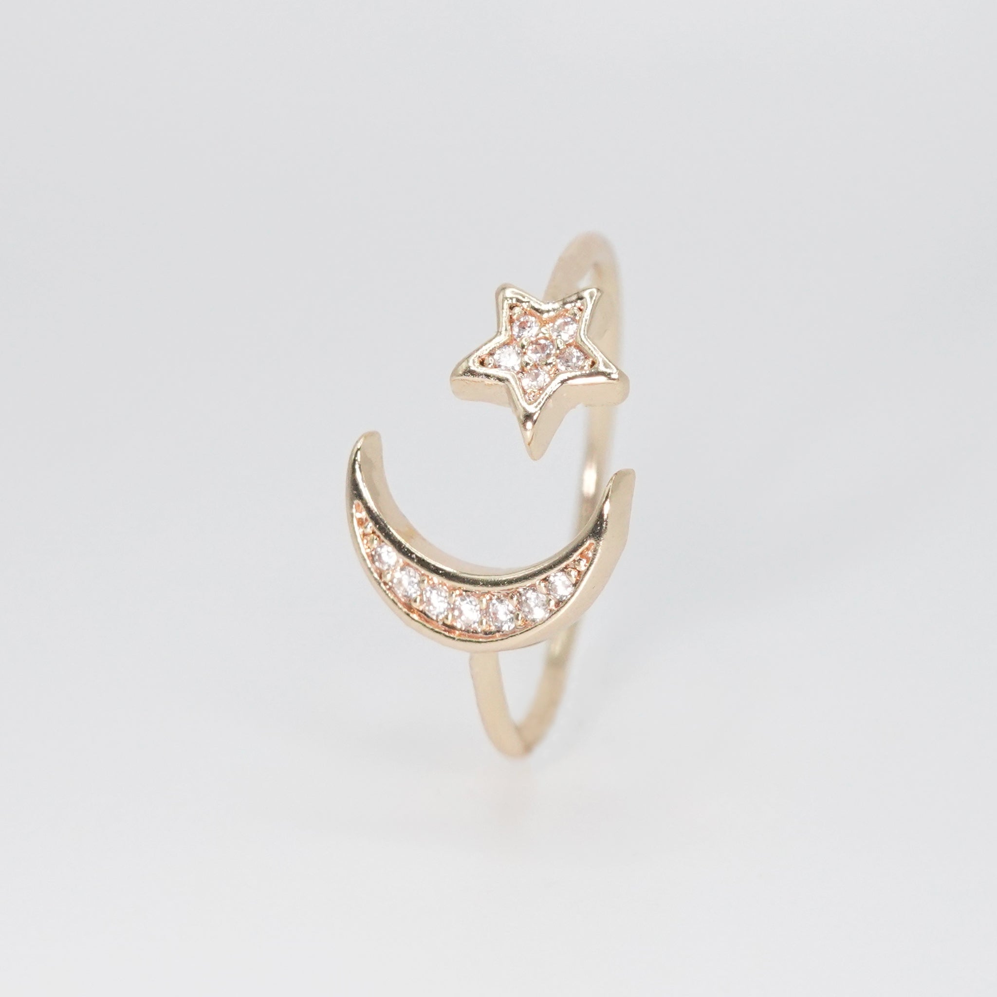 Crescent Ring - A celestial marvel with new moon and star detailing.