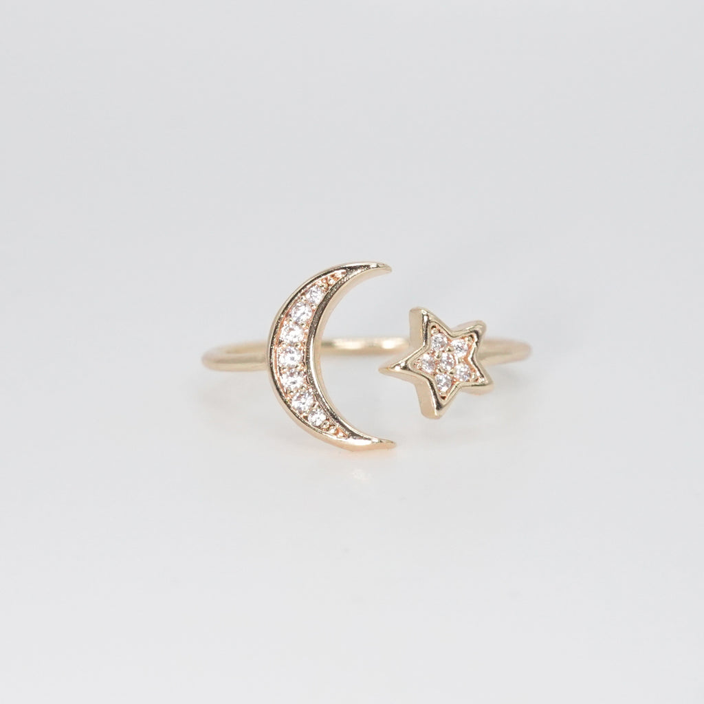 Crescent Ring - A celestial marvel with new moon and star detailing.