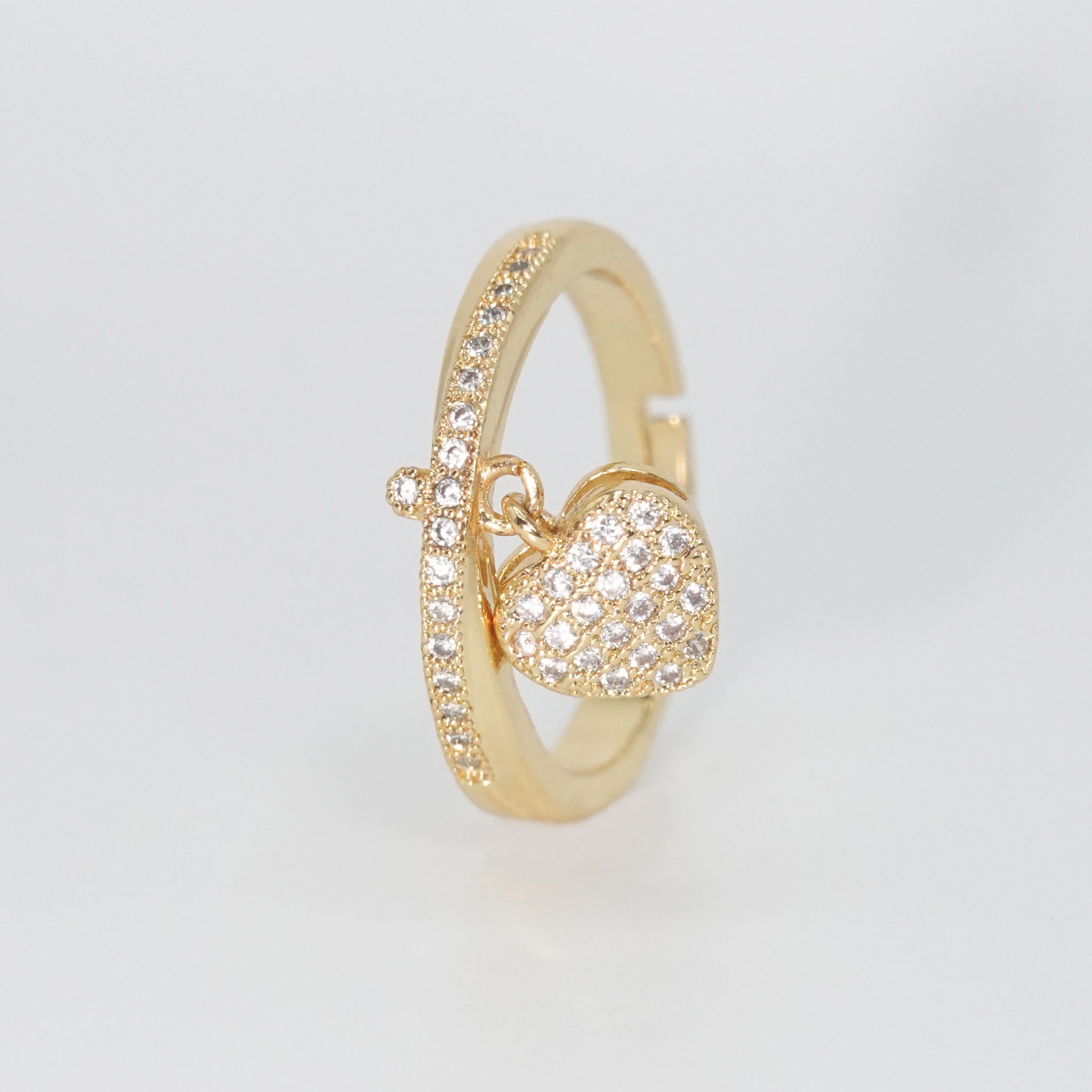 Le Doux Ring - Enchanting accessory with attached heart charm.