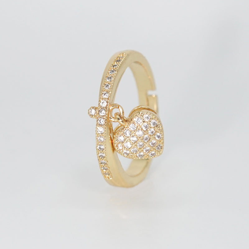 Le Doux Ring - Enchanting accessory with attached heart charm.
