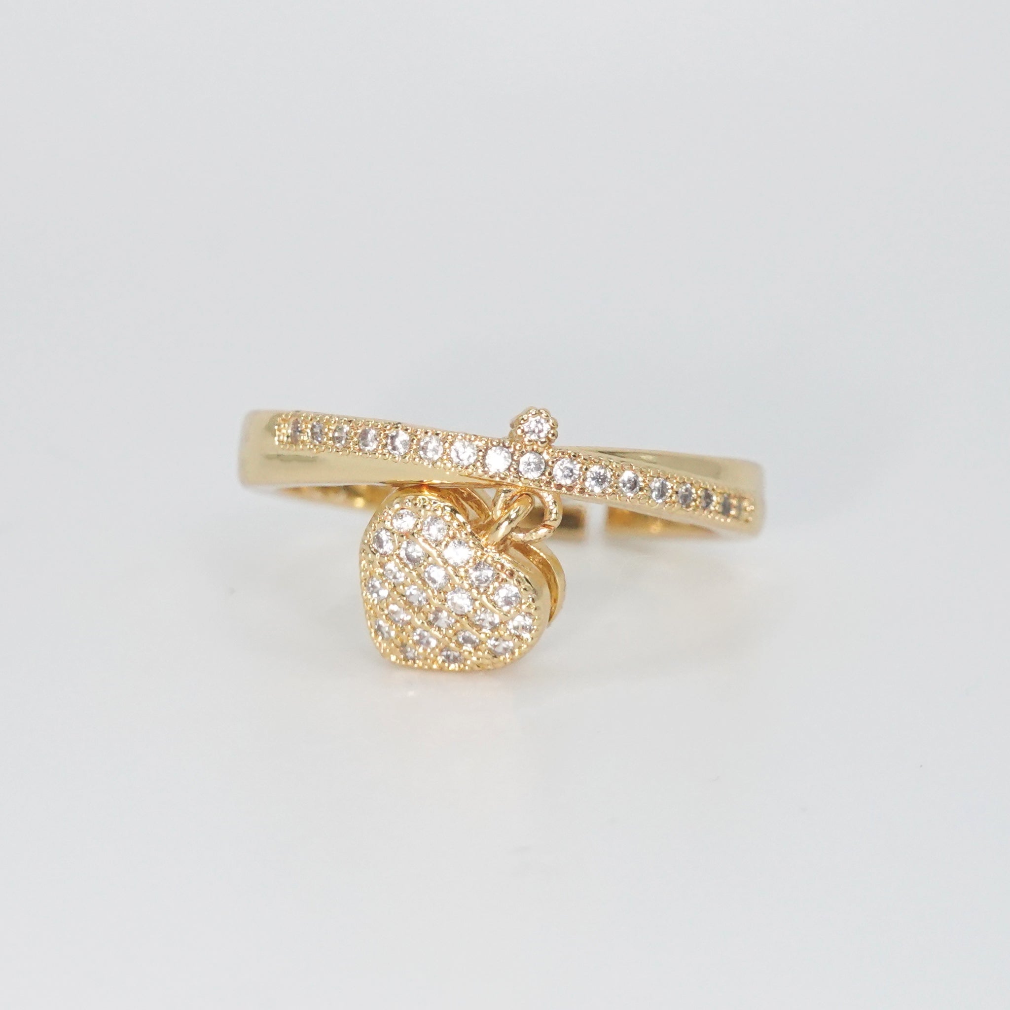 Le Doux Ring - Enchanting accessory with attached heart charm.