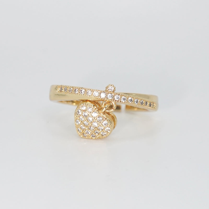 Le Doux Ring - Enchanting accessory with attached heart charm.