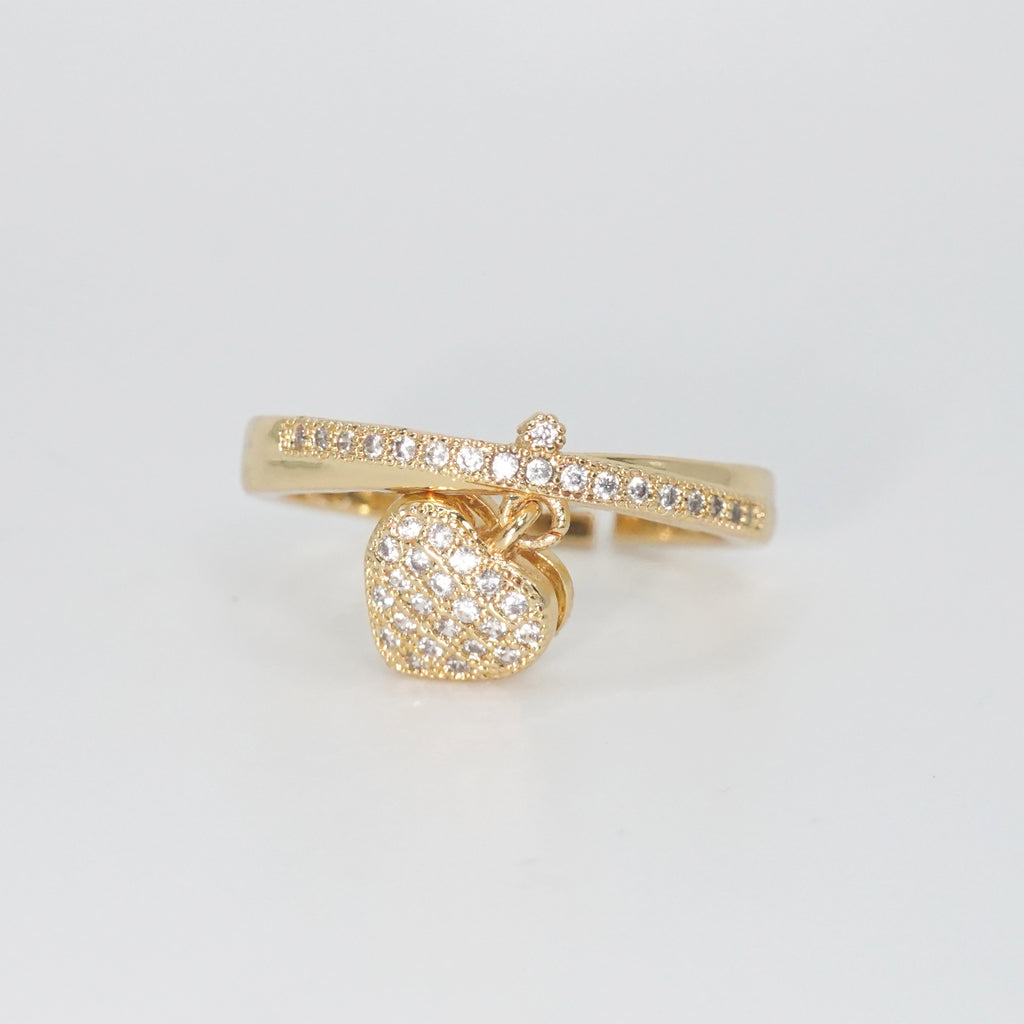 Le Doux Ring - Enchanting accessory with attached heart charm.