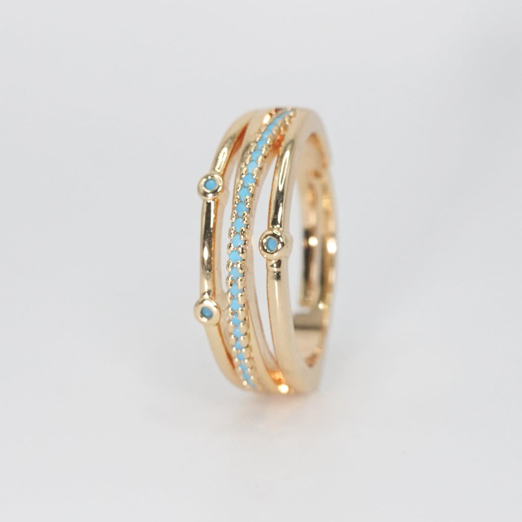 Lomitas Ring - Exquisite ring with three sleek lines and striking blue accents.
