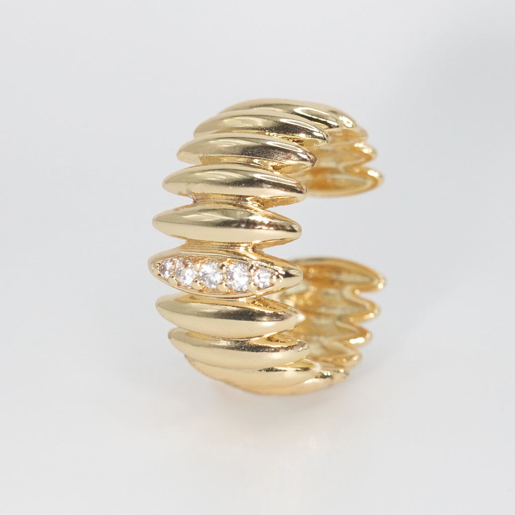Spalding Ring - Striking bold accessory with horizontal lines and sparkling stones.
