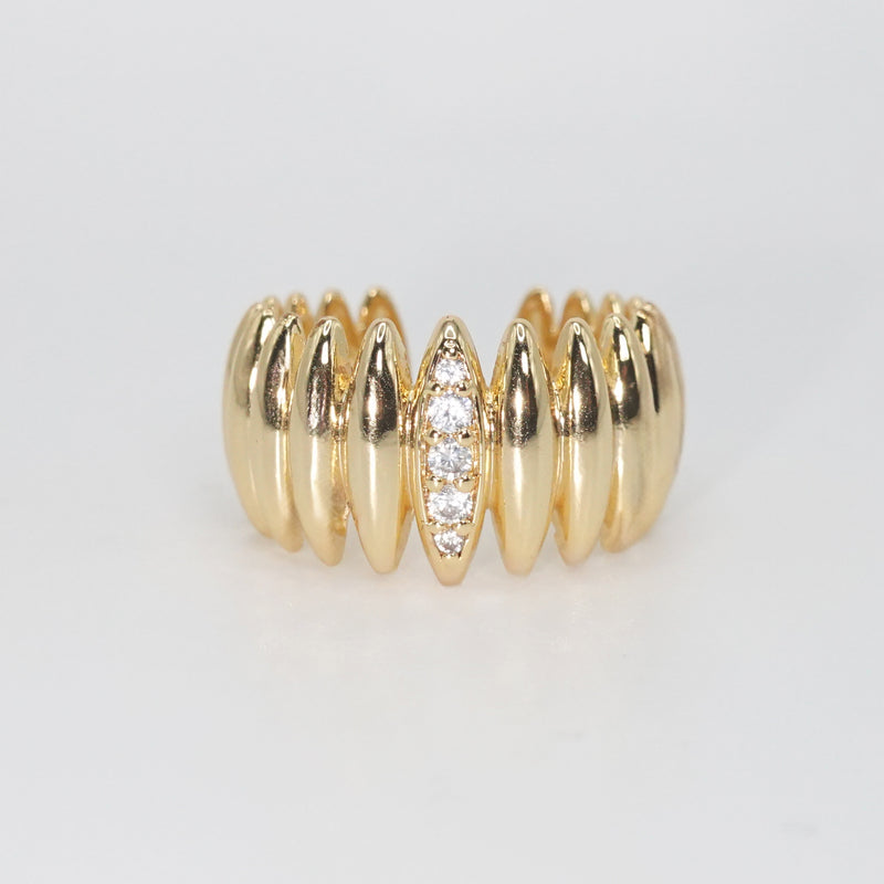 Spalding Ring - Striking bold accessory with horizontal lines and sparkling stones.