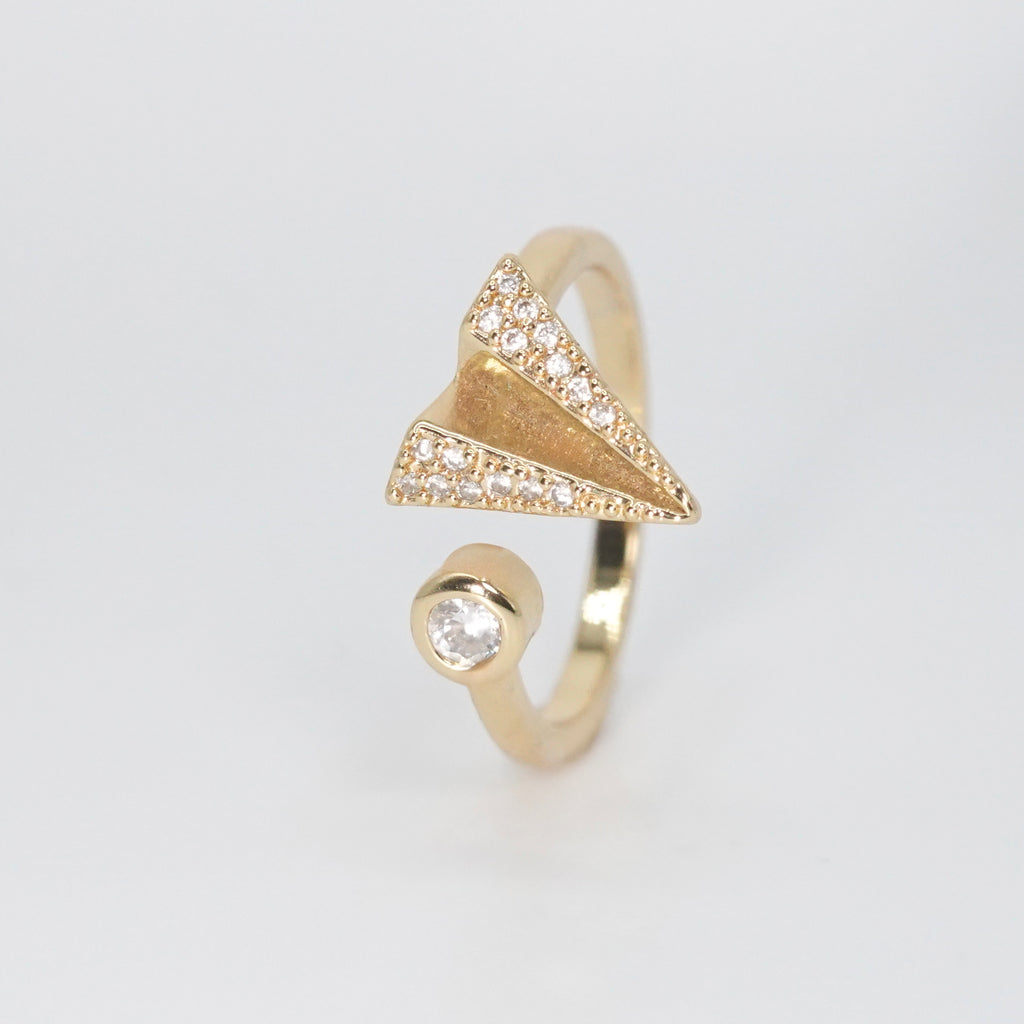 Doheny Ring - Whimsical paper airplane-shaped accessory for a playful touch.