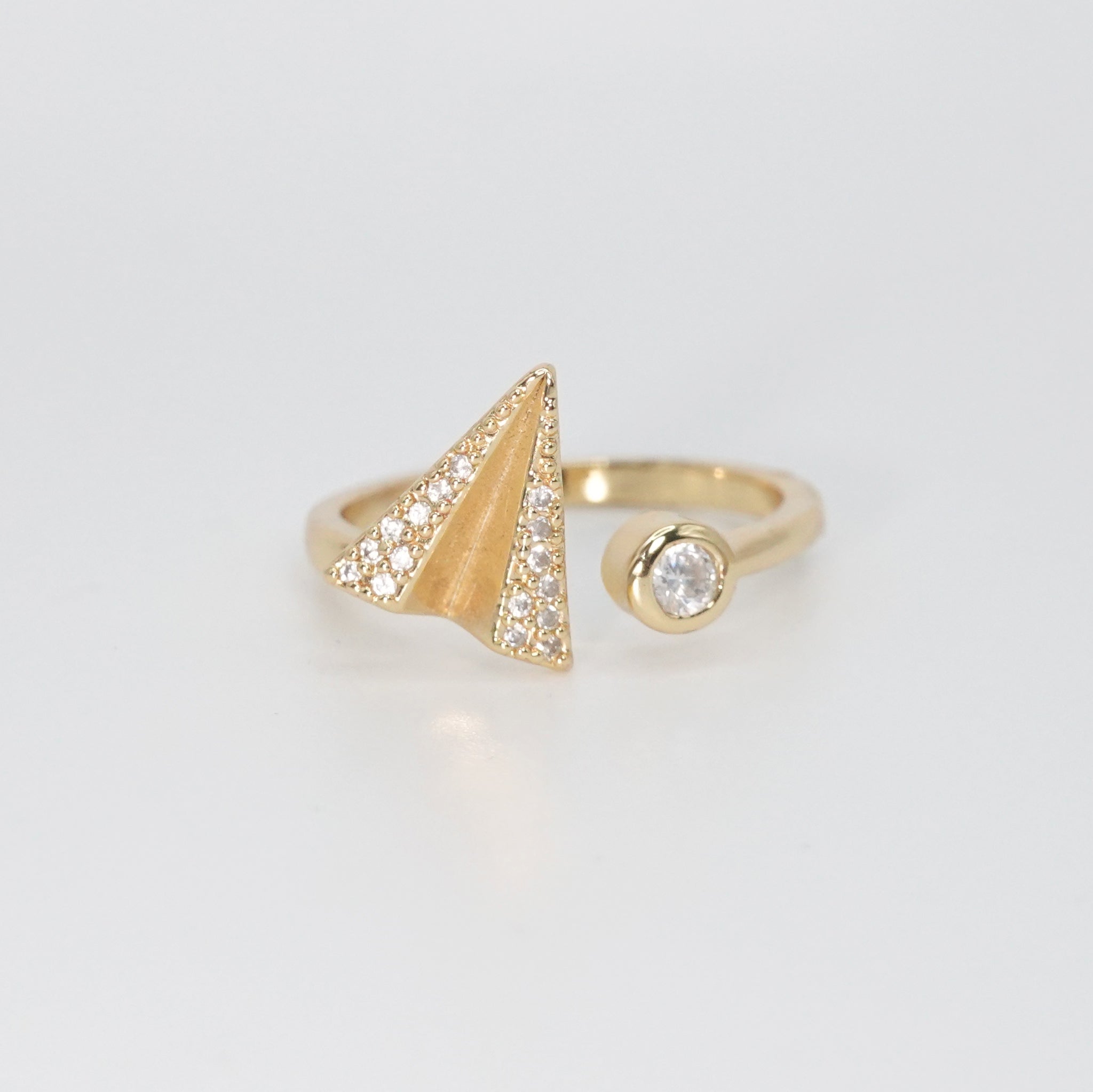 Doheny Ring - Whimsical paper airplane-shaped accessory for a playful touch.