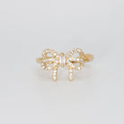 Las Flores Ring - Gift bow motif with sparkling stones.
