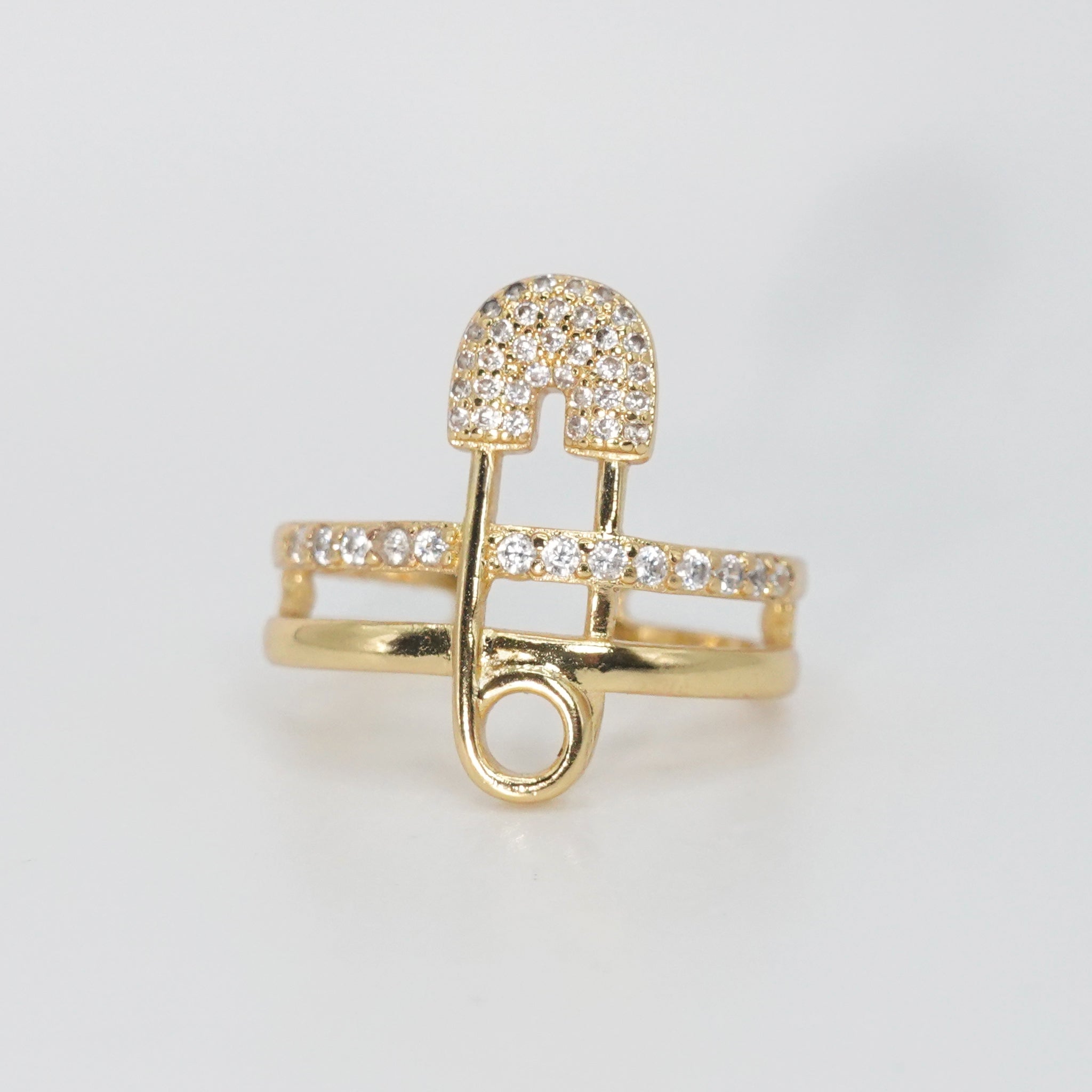 Decker Ring - Sterling silver ring with safety pin design and sparkling stones.