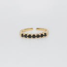  Puerco Ring - Sleek ring adorned with striking black stones.