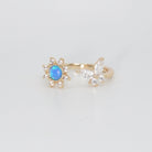 Sweetwater Ring - Opal centerpiece with butterfly and shimmering stones.